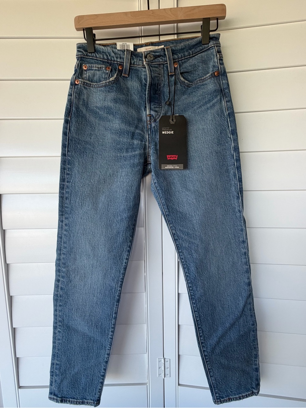 Levi's light blue Wedgie high-rise tapered jeans